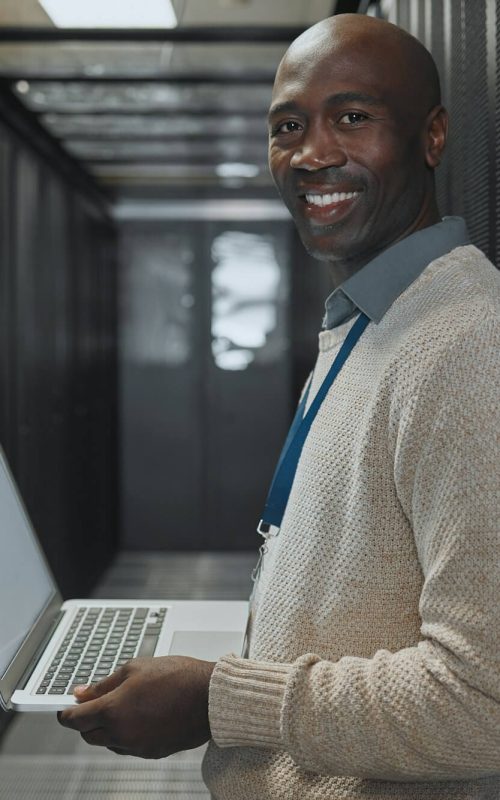 server-room-laptop-and-man-portrait-or-technician-for-data-center-system-and-cybersecurity-code-.jpg server-room-laptop-and-man-portrait-or-technician-for-data-center-system-and-cybersecurity-code-.jpg
